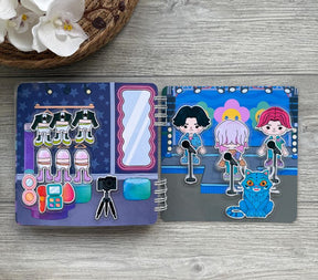 LIVRO INTERATIVO GUERREIRAS DO K-POP E SAJA BOYS