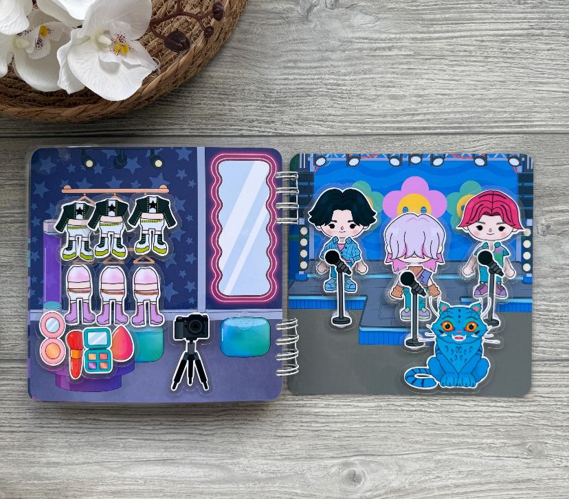 LIVRO INTERATIVO GUERREIRAS DO K-POP E SAJA BOYS