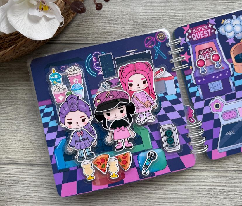 LIVRO INTERATIVO GUERREIRAS DO K-POP E SAJA BOYS